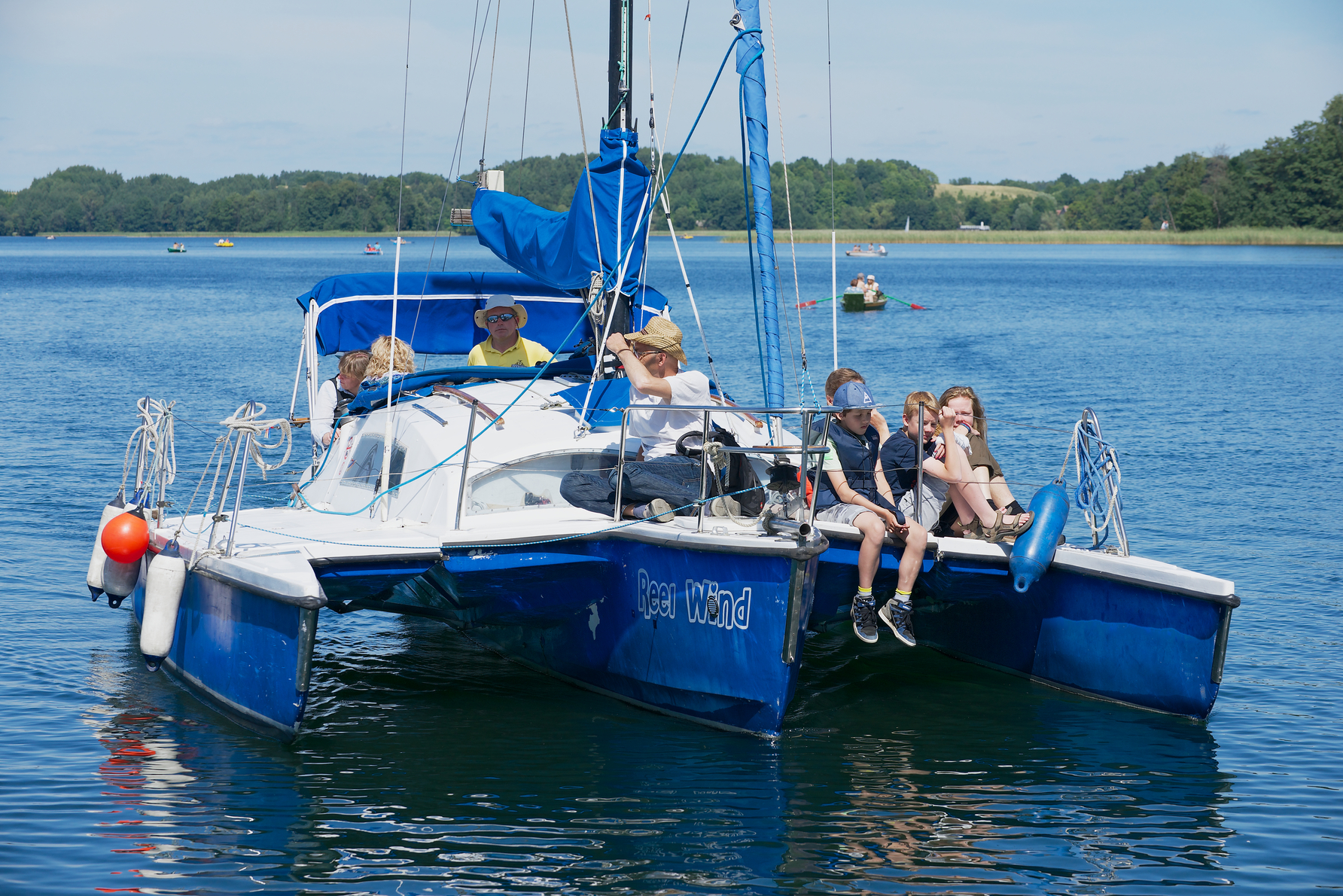 People enjoy boat trip at Galve lake in Trakai, Lithuania.