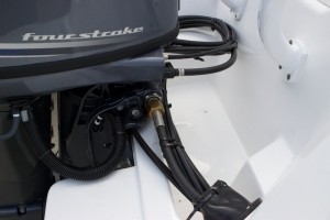 A photo of the fuel supply system on an outboard engine. 