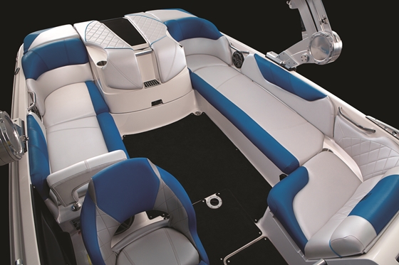 With a V-drive, the engine can be located farther aft. This makes bigger wakes for wakeboarders, and opens up room in the cockpit.