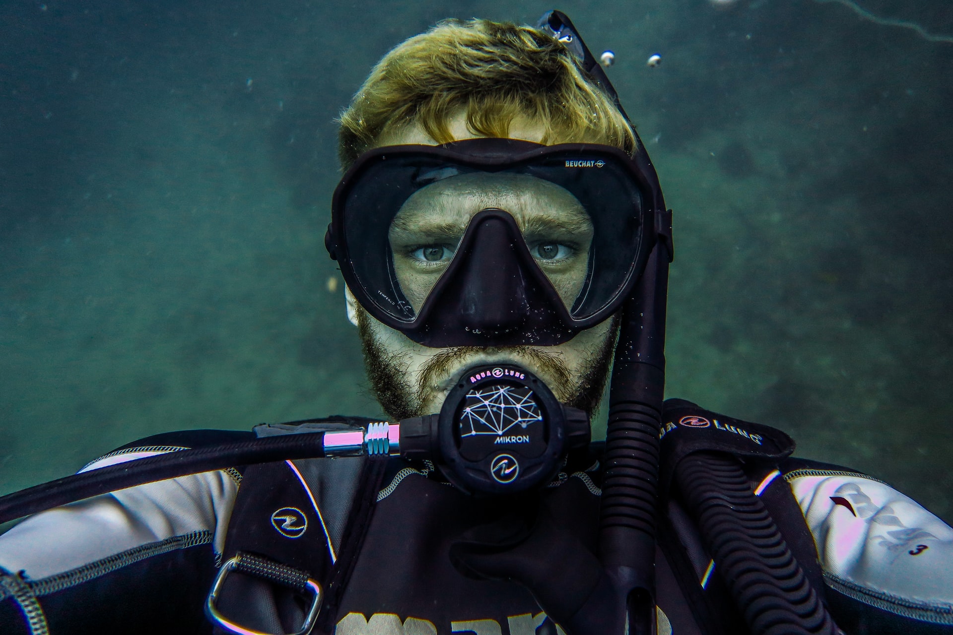 Man-diving-underwater